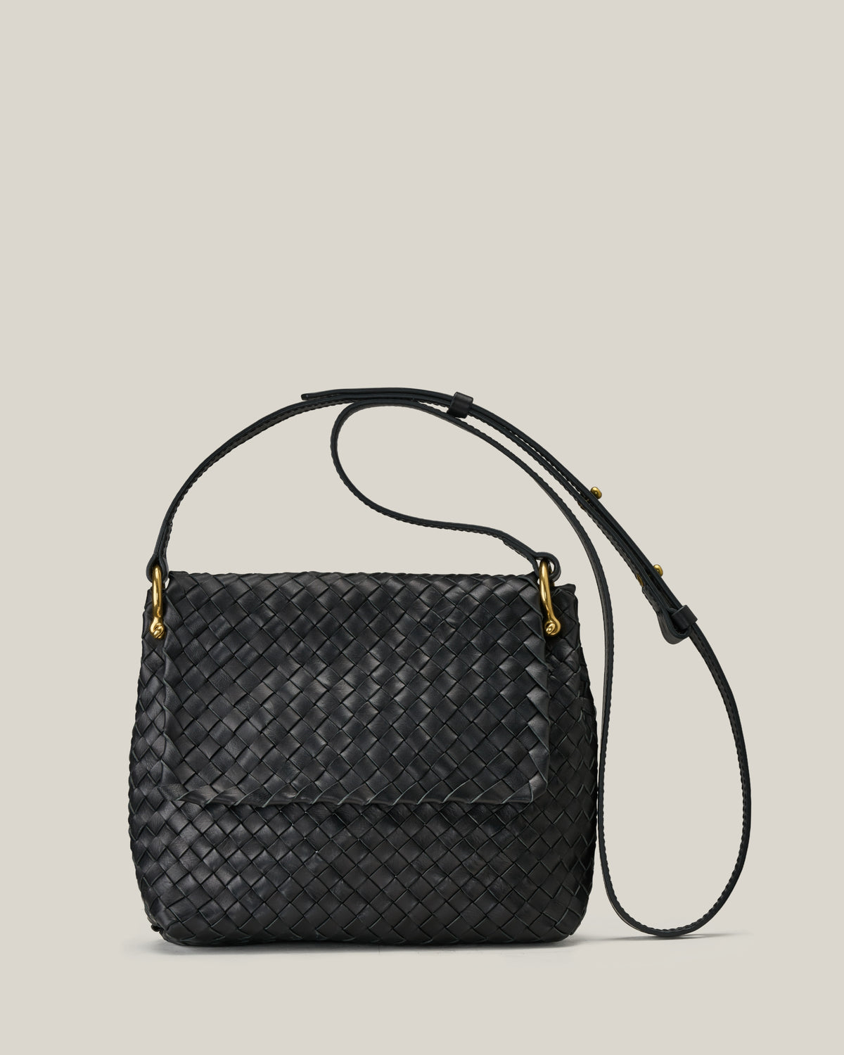 Saddle – Borsa postina in vacchetta intrecciata nera
