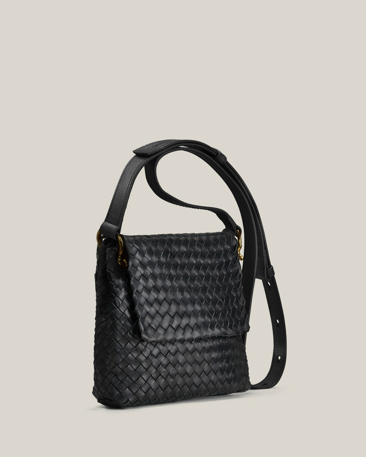 Saddle – Borsa postina in vacchetta intrecciata nera